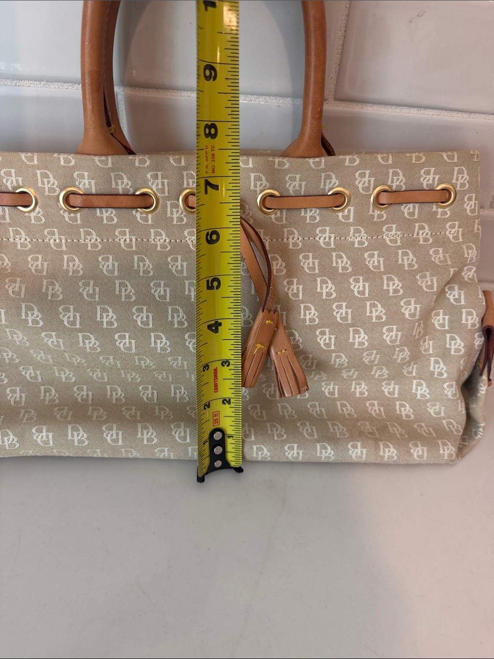 Dooney & Bourke tassel tote with brown leather handles - Picture 11 of 12